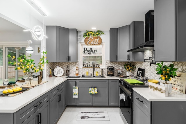 1174 Belden Rd, Columbus, OH 43229 - kitchen featuring wall chimney range hood, gray cabinets, range with electric stovetop, and tasteful backsplash