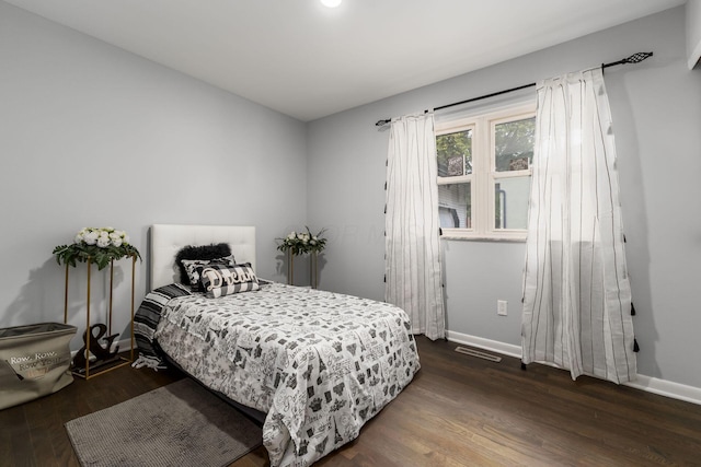 1174 Belden Rd, Columbus, OH 43229 - bedroom with wood finished floors and baseboards