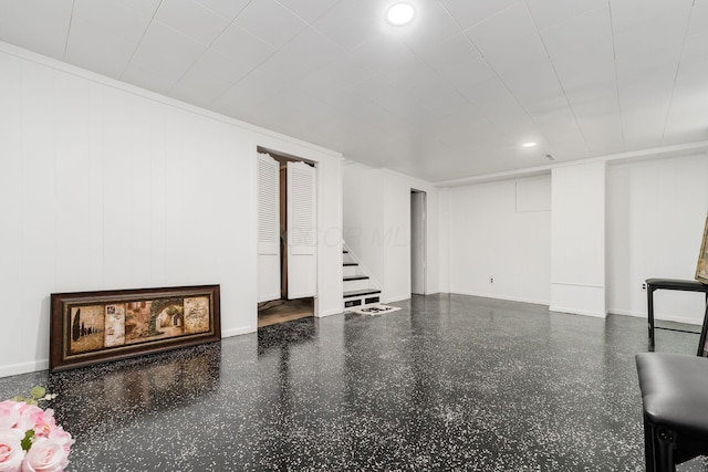 1174 Belden Rd, Columbus, OH 43229 - unfurnished living room featuring stairway, recessed lighting, and speckle patterned floor