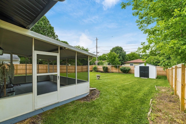 1174 Belden Rd, Columbus, OH 43229 - fenced backyard featuring a sunroom and a storage shed