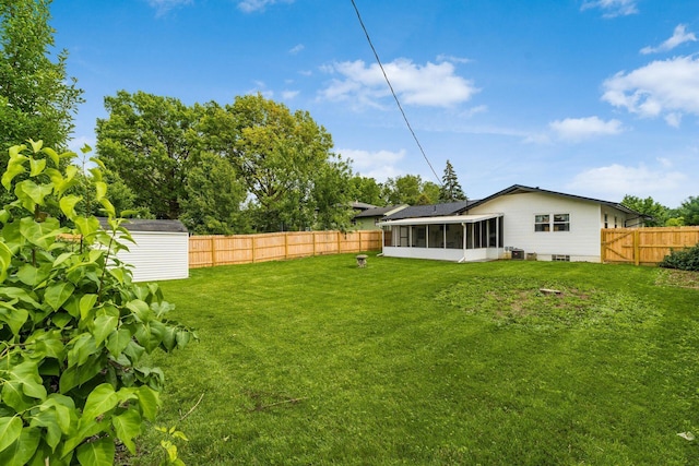 1174 Belden Rd, Columbus, OH 43229 - fenced backyard with a sunroom and a storage shed