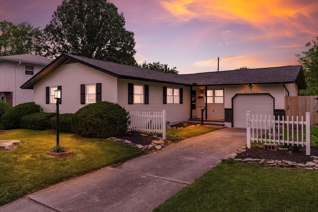 1174 Belden Rd, Columbus, OH 43229 - single story home with an attached garage, concrete driveway, and a shingled roof
