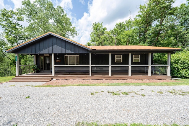 63775 State Route 56, Creola, OH 45622 - view of front of home featuring board and batten siding and covered porch
