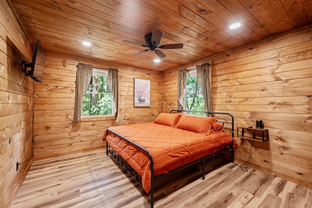 63775 State Route 56, Creola, OH 45622 - bedroom with wooden ceiling, multiple windows, light wood-style floors, wood walls, and recessed lighting