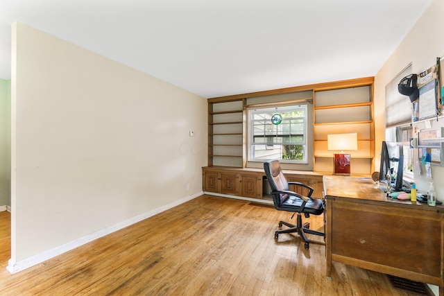 2909 Bryden Rd, Columbus, OH 43209 - home office featuring light wood finished floors and baseboards