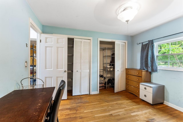 2909 Bryden Rd, Columbus, OH 43209 - dining area with light wood-type flooring and baseboards