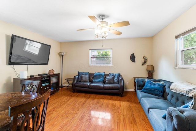 2909 Bryden Rd, Columbus, OH 43209 - living area with light wood finished floors and ceiling fan