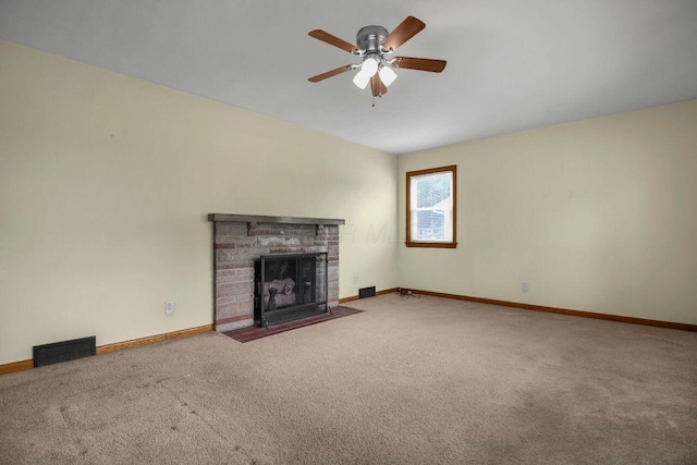 824 Colonial Dr, Heath, OH 43056 - unfurnished living room with carpet floors, ceiling fan, and a fireplace with flush hearth