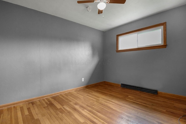 824 Colonial Dr, Heath, OH 43056 - unfurnished room featuring ceiling fan and wood finished floors