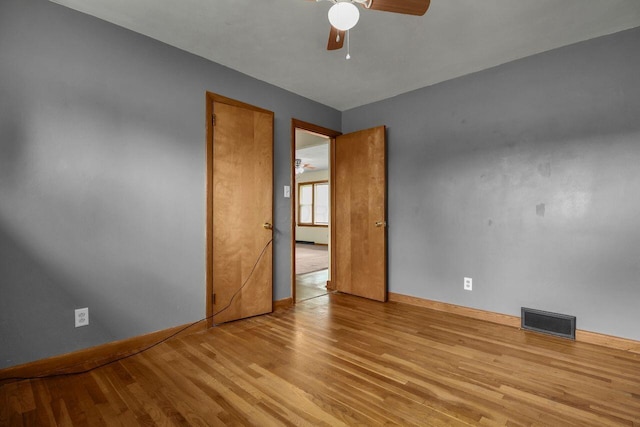 824 Colonial Dr, Heath, OH 43056 - spare room featuring wood finished floors and a ceiling fan