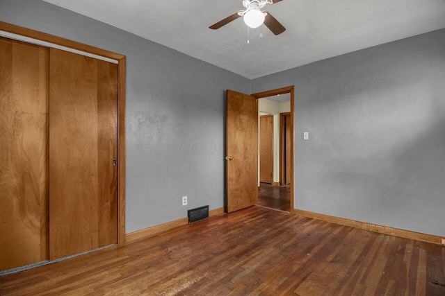 824 Colonial Dr, Heath, OH 43056 - unfurnished bedroom with wood finished floors and ceiling fan