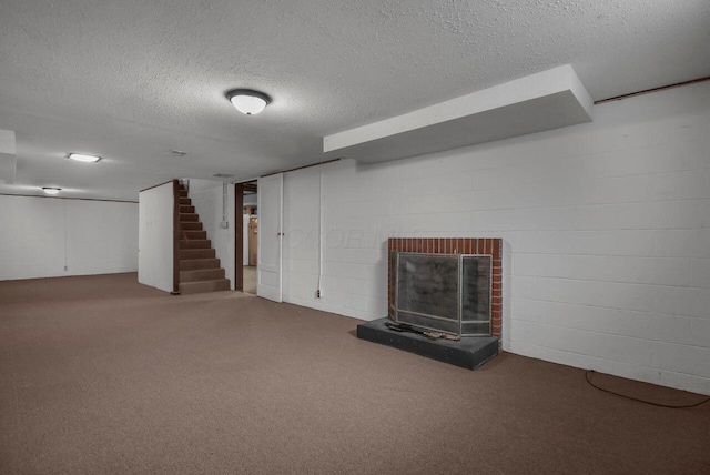 824 Colonial Dr, Heath, OH 43056 - finished basement featuring a textured ceiling, stairs, a brick fireplace, carpet, and concrete block wall