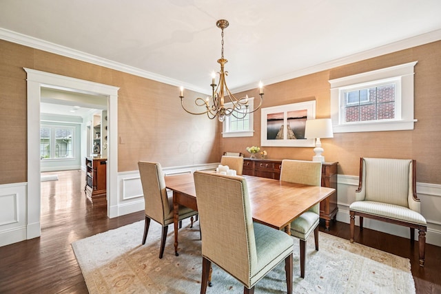1968 Coventry Rd, Upper Arlington, OH 43212 - dining room featuring a chandelier, a wainscoted wall, wood finished floors, ornamental molding, and a decorative wall