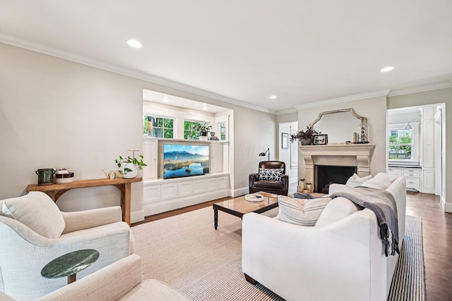 1968 Coventry Rd, Upper Arlington, OH 43212 - living room featuring wood finished floors, recessed lighting, a fireplace, and crown molding