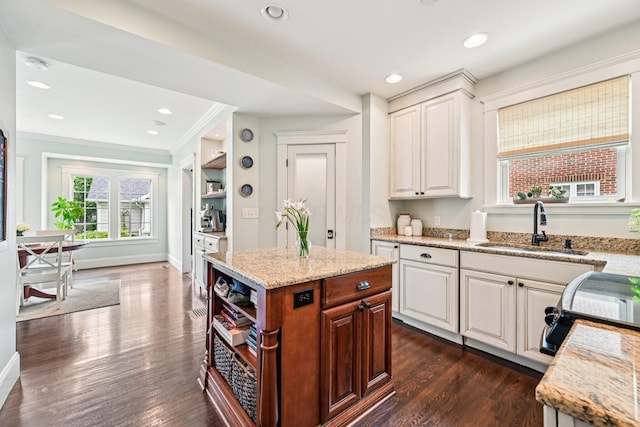 1968 Coventry Rd, Upper Arlington, OH 43212 - kitchen featuring light stone countertops, dark wood finished floors, white cabinetry, recessed lighting, and open shelves