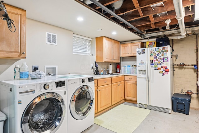 1968 Coventry Rd, Upper Arlington, OH 43212 - washroom featuring separate washer and dryer, cabinet space, and recessed lighting