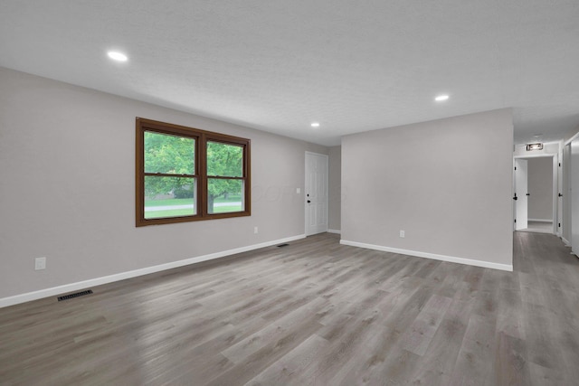 251 Florence Dr, Pickerington, OH 43147 - spare room featuring wood finished floors and recessed lighting