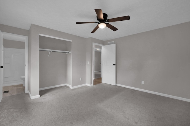 251 Florence Dr, Pickerington, OH 43147 - unfurnished bedroom with carpet, a closet, a ceiling fan, and connected bathroom