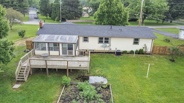 251 Florence Dr, Pickerington, OH 43147 - back of house featuring a wooden deck, a chimney, a sunroom, and a shingled roof