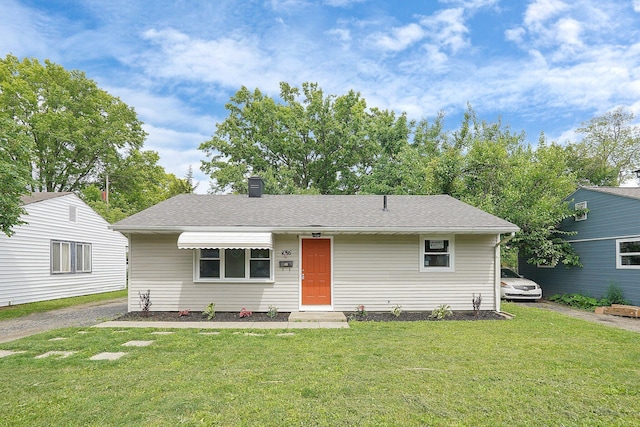 1086 S Hampton Rd, Columbus, OH 43227 - view of front of home featuring a front yard and a chimney