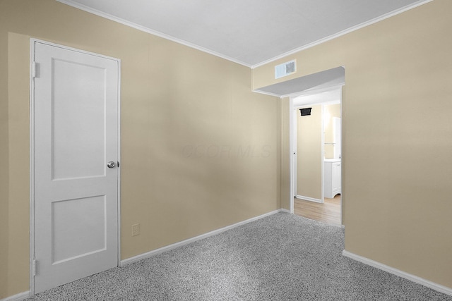 1086 S Hampton Rd, Columbus, OH 43227 - carpeted empty room with crown molding and baseboards