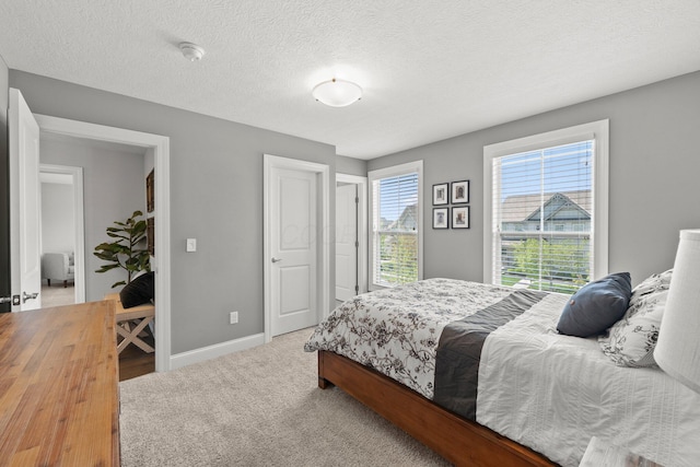 10640 Honeysuckle Way, Plain City, OH 43064 - bedroom featuring baseboards and a textured ceiling