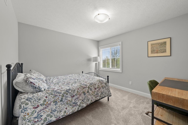 10640 Honeysuckle Way, Plain City, OH 43064 - carpeted bedroom featuring baseboards and a textured ceiling