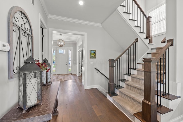 10640 Honeysuckle Way, Plain City, OH 43064 - foyer with dark wood-style flooring, stairway, ornamental molding, recessed lighting, and a chandelier