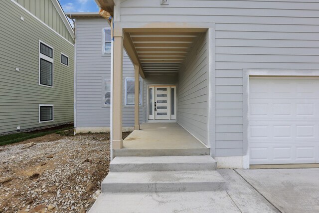 3699 Kassidy Dr, Grove City, OH 43123 - view of exterior entry with a garage
