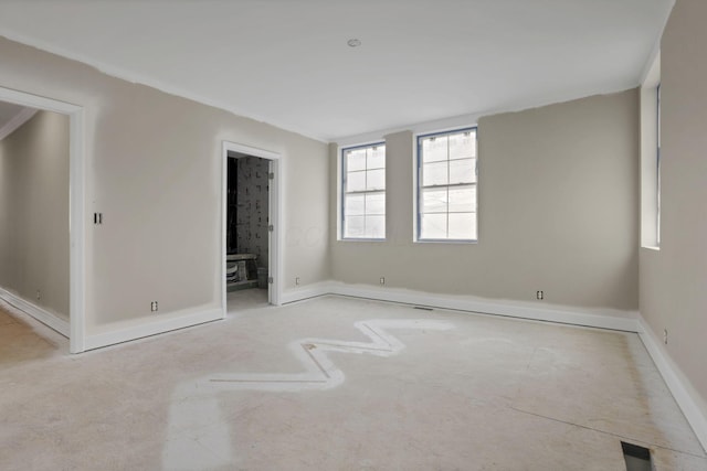 3699 Kassidy Dr, Grove City, OH 43123 - unfurnished bedroom featuring baseboards and connected bathroom