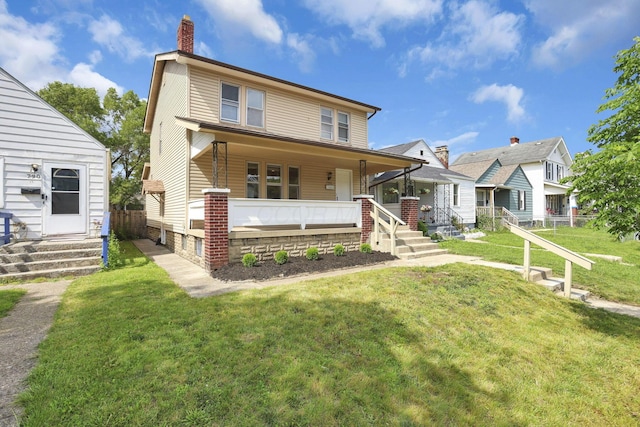 794 E Deshler Ave, Columbus, OH 43206 - view of front facade featuring a chimney, a porch, and a residential view