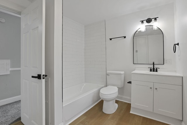 794 E Deshler Ave, Columbus, OH 43206 - bathroom with vanity, wood finished floors, and  shower combination