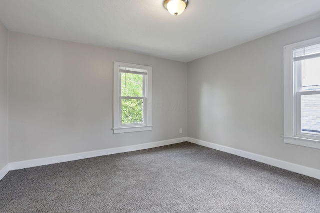 794 E Deshler Ave, Columbus, OH 43206 - unfurnished room featuring carpet and baseboards