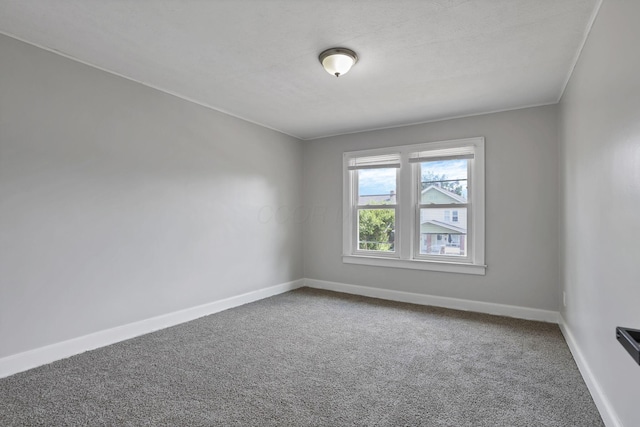 794 E Deshler Ave, Columbus, OH 43206 - carpeted spare room featuring baseboards
