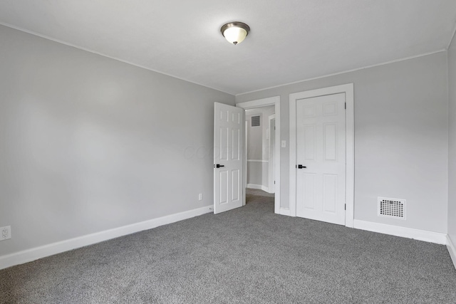 794 E Deshler Ave, Columbus, OH 43206 - carpeted spare room featuring baseboards and ornamental molding