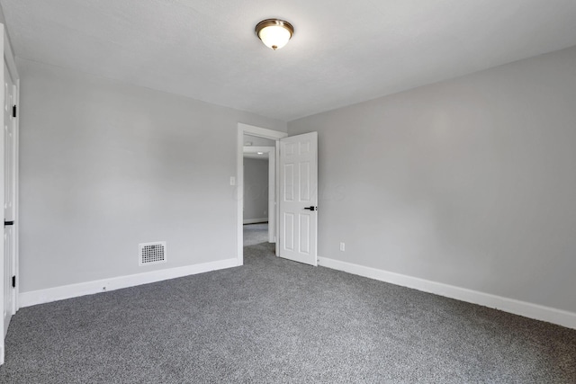 794 E Deshler Ave, Columbus, OH 43206 - empty room featuring carpet flooring and baseboards