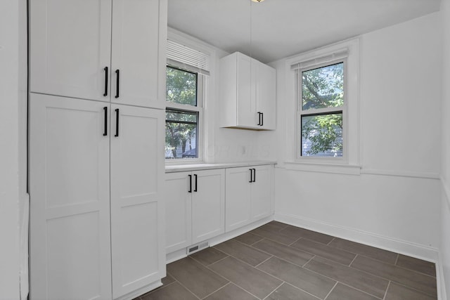 794 E Deshler Ave, Columbus, OH 43206 - kitchen with white cabinetry and light countertops