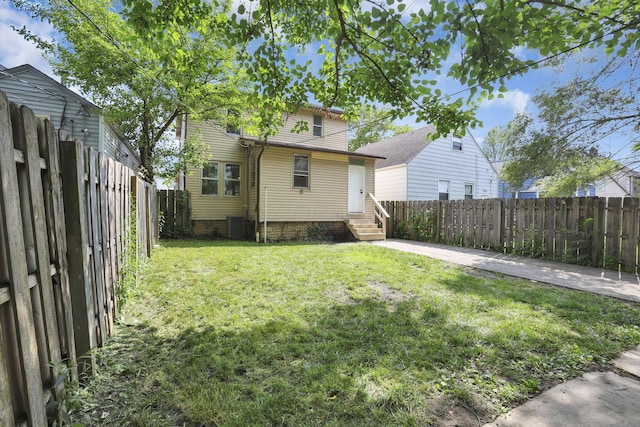 794 E Deshler Ave, Columbus, OH 43206 - back of house with entry steps and a fenced backyard