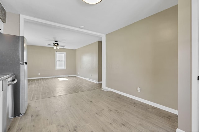 678 E Fair Ave, Lancaster, OH 43130 - empty room featuring a ceiling fan and light wood-type flooring