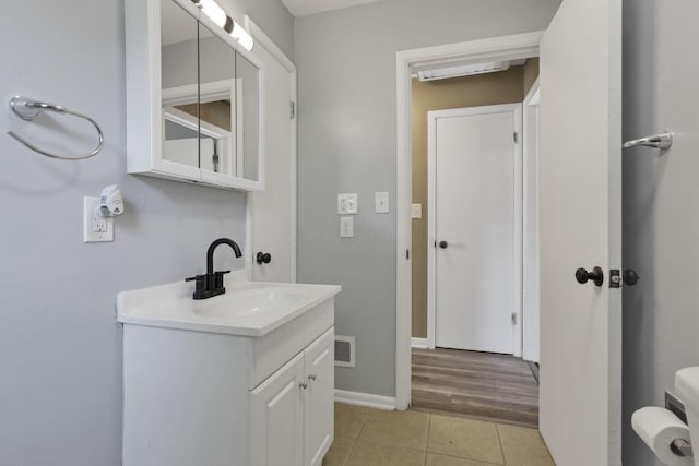 678 E Fair Ave, Lancaster, OH 43130 - bathroom featuring tile patterned floors and vanity