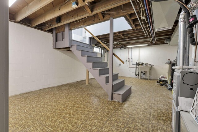 678 E Fair Ave, Lancaster, OH 43130 - unfinished basement with stairway and tile patterned floors