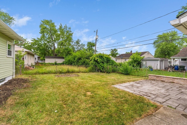 2203 Belcher Dr, Columbus, OH 43224 - view of yard featuring a patio