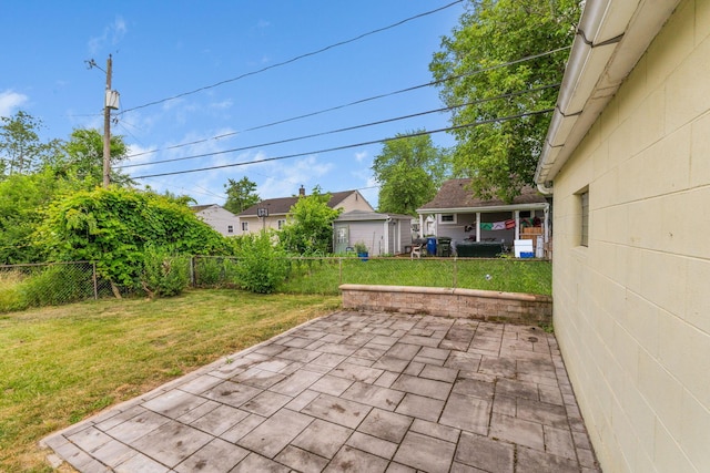 2203 Belcher Dr, Columbus, OH 43224 - fenced backyard with a patio area