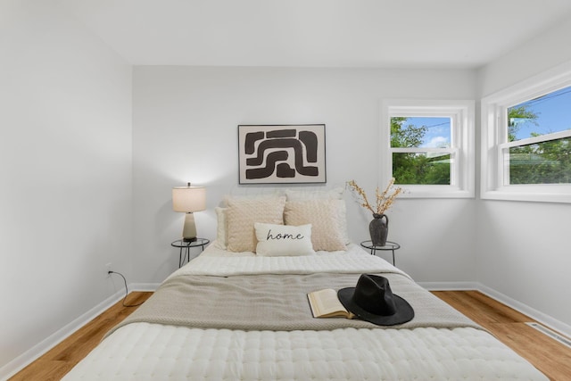 2203 Belcher Dr, Columbus, OH 43224 - bedroom featuring wood finished floors and baseboards