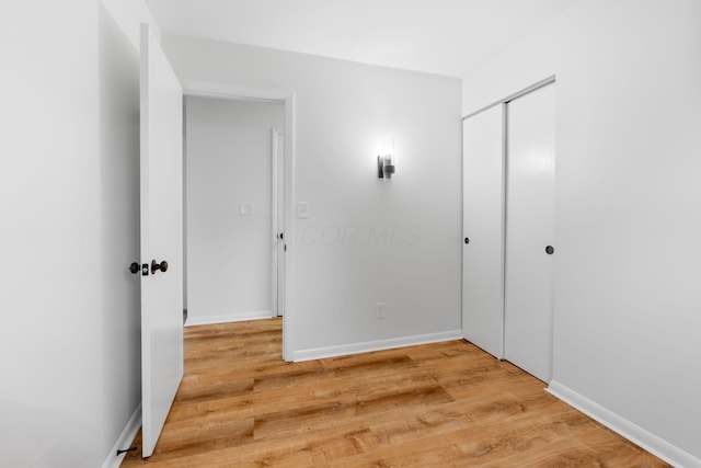 2203 Belcher Dr, Columbus, OH 43224 - corridor with light wood-style floors