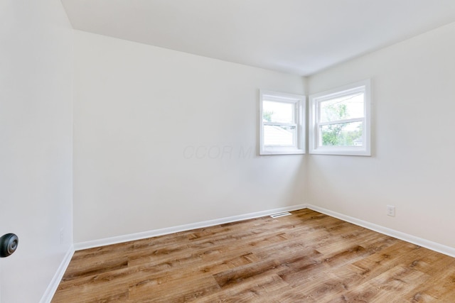 2203 Belcher Dr, Columbus, OH 43224 - unfurnished room with wood finished floors and baseboards