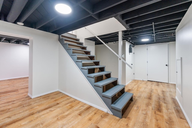 2203 Belcher Dr, Columbus, OH 43224 - finished basement with stairway and wood finished floors