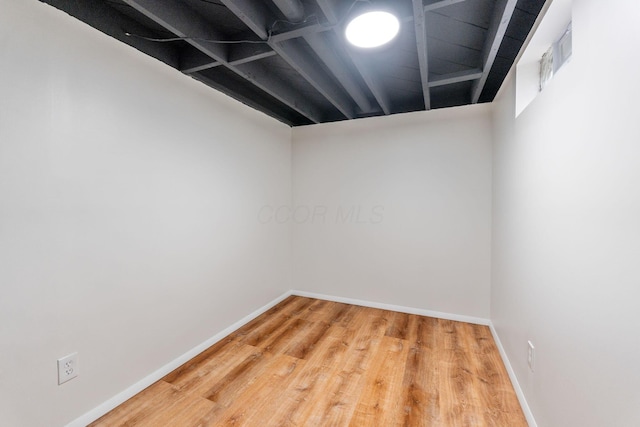 2203 Belcher Dr, Columbus, OH 43224 - finished basement featuring wood finished floors and baseboards