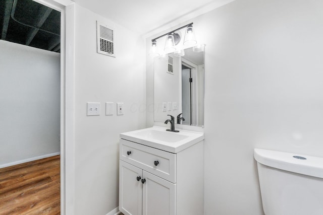 2203 Belcher Dr, Columbus, OH 43224 - bathroom with vanity and wood finished floors