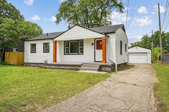 1358 Moler Rd, Columbus, OH 43207 - bungalow-style home featuring a chimney, an outdoor structure, a porch, a detached garage, and a shingled roof